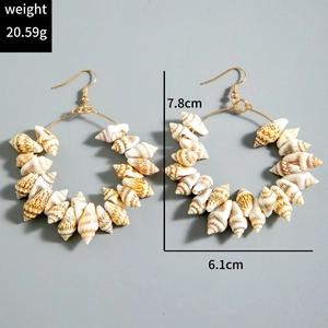 Detail view of boho shell earrings with dimensions 7.8cm by 6.1cm and 20.59g weight
