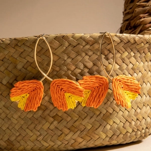 Handmade leaf raffia drop earrings with golden rings for bohemian beach style vacation