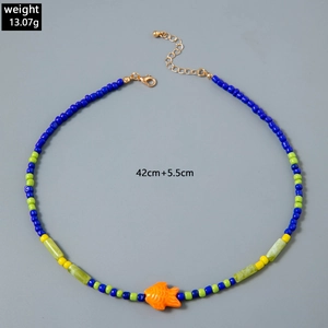 Detail showing handmade colorful beaded necklace with fish pendant, 42cm length and 13g weight