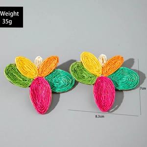 Detailed view of handmade colorful raffia leaf earrings with size and weight measurements