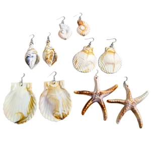 Collection of beach style shell and starfish earrings with natural marble textures