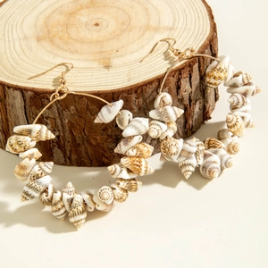 Natural sea shell hoop earrings with golden fish hooks and bohemian beach style design