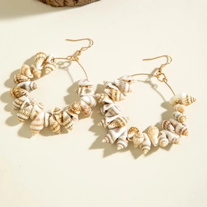Bohemian gold hoop earrings with natural conch shells and stars for beach style fashion