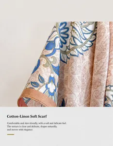 Close-up of floral paisley silk-touch scarf fabric with fine texture and draped finish