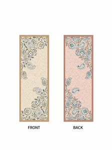 Detail of double-sided paisley scarf in beige and dusty rose with floral patterns