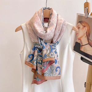 Elegant paisley and tropical print silk scarf styled on white dress for summer