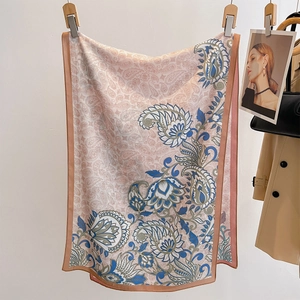 Luxurious pink silk-feel shawl featuring blue paisley and floral prints for women