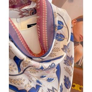 Elegant floral print silk scarf with vintage botanical patterns in beige and navy blue