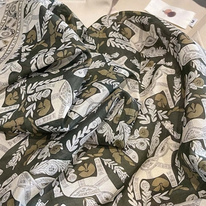 Classic vintage horse print square scarf in dark green and gold with smooth silk texture