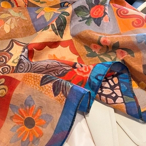 Artistic vintage patchwork floral silk scarf with warm orange and navy blue patterns