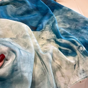 Elegant summer silk square scarf with blue and green tie-dye print and smooth texture