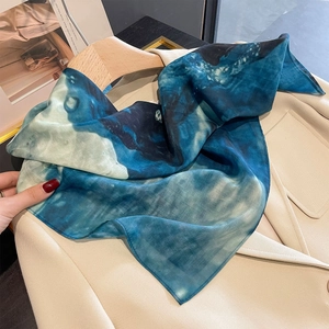 Luxurious mulberry silk square scarf with blue marble print on beige blazer jacket