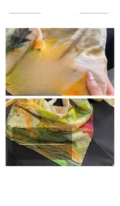 Gros plan du foulard en soie à fleurs montrant des coutures fines et un tissu respirant