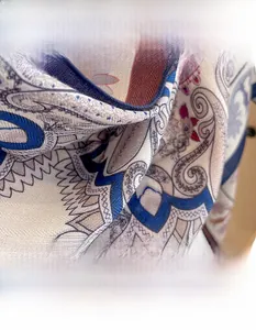 Detail of paisley print scarf showing soft cotton-linen texture and intricate patterns