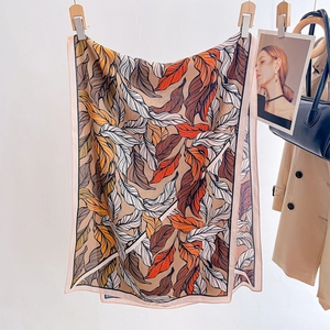 Chic leaf print beach scarf with retro botanical pattern for summer styling