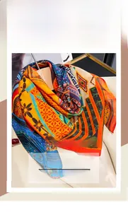Close-up of lightweight silk-cotton square scarf with colorful ethnic geometric patterns