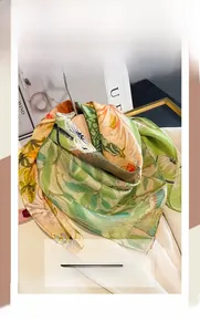 Detailed view of lightweight floral silk cotton scarf with botanical leaf patterns