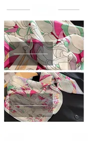 Dettaglio del foulard in seta con stampa di tulipani e bordi rifiniti su una giacca nera