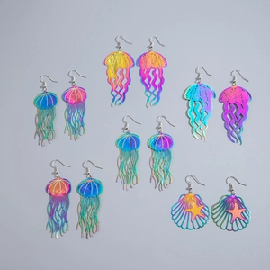 Colorful jellyfish and starfish dangle earrings with iridescent metal gradient finish