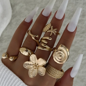 Golden starfish and flower open ring set for women in ocean inspired beach vacation style