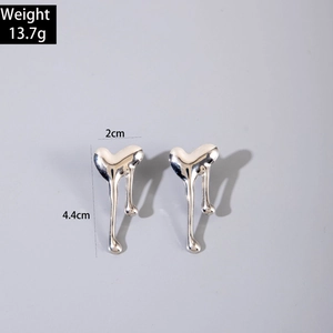 Detailed view of silver liquid heart earrings with dimensions 4.4cm and weight 13.7g