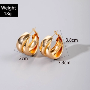 Detailed view of chunky gold hoop earrings with dimensions and 18g weight specifications