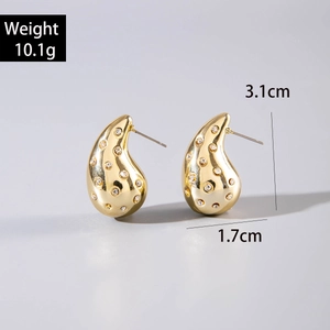 Detail of gold teardrop earrings with crystals including weight and size measurements