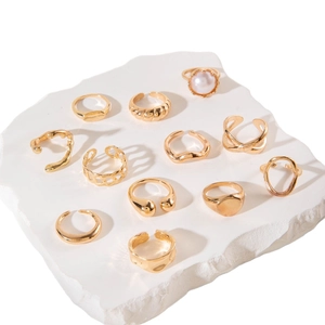 12pcs vintage irregular gold ring set with pearls on white stone display stand