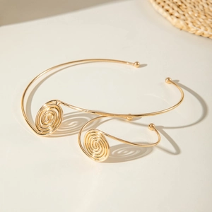 Modern gold-plated snake chain swirl pendant necklace and open cuff bracelet jewelry set