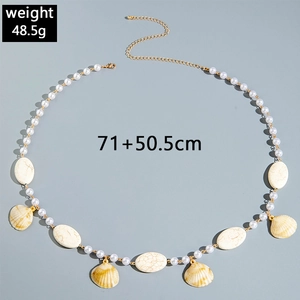 Detail view of pearl beaded body chain with natural shell charms, weight 48.5g, length 121.5cm