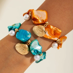 Bohemian ocean style bracelet set with turquoise stones, shell charms and pearls