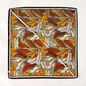 Silk twill square scarf with colorful autumn leaf pattern and black rolled hem detail