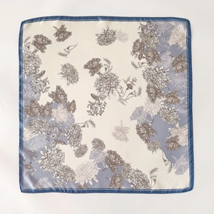 Double-sided floral silk square scarf in light blue and beige with elegant daisy print