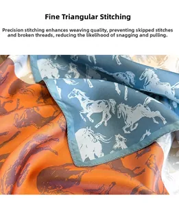 Macro shot of fine triangular needle stitching on orange and blue silk scarf with horse print