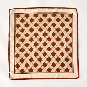 Elegant silk scarf with classic beige and brown diamond plaid pattern and red border