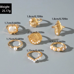 Detailansicht des 7-teiligen Goldringsatzes mit Größenangaben für Boho-Schmuck