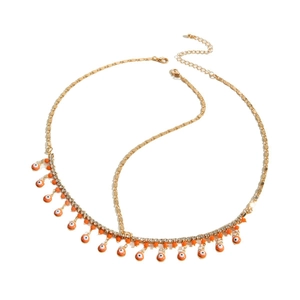 Chaîne de corps bohème dorée avec pendentif œil maléfique orange et strass brillants