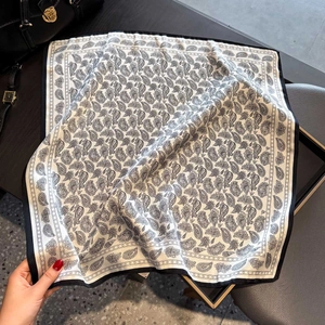 Silk square scarf with black and white paisley pattern and elegant border