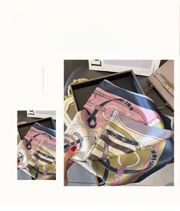 Detail view of the colorful equestrian print on the elegant silk square scarf