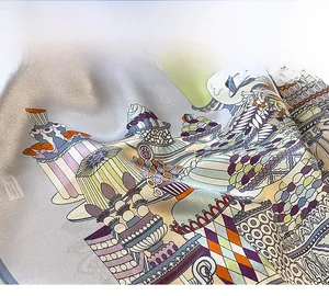 Detailed view of high-quality silk scarf with precise stitching and dessert pattern