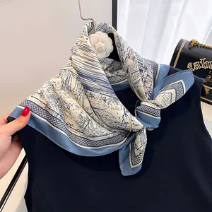 Elegant mulberry silk scarf with blue and white landscape print for sun protection