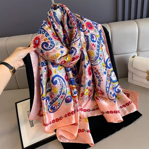 Pink paisley floral silk shawl with blue patterns and soft sheen for summer sun protection