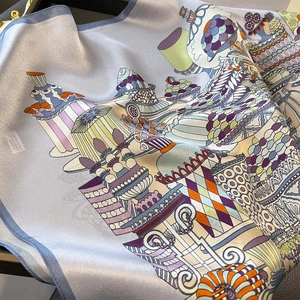 Detailed view of square silk scarf showing complex narrative illustrations in soft light blue