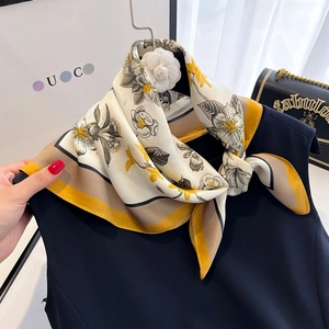 Floral print silk scarf for women featuring artistic hand-painted flower patterns and color-block edges