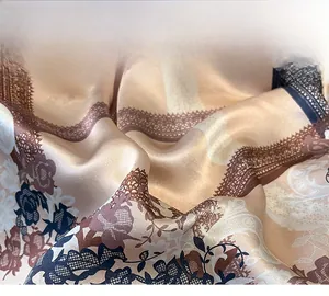 Detailed view of high-quality silk scarf fabric with vintage floral prints and smooth edges