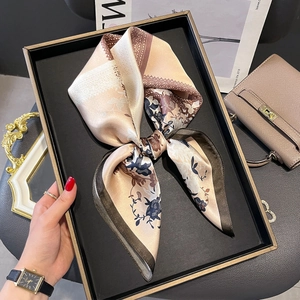 Elegant silk floral square scarf in vintage print presented in a luxury gift box
