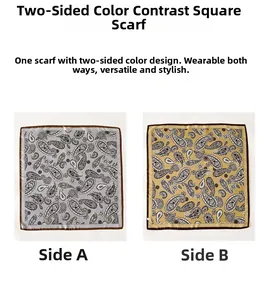 Détail macro du foulard en soie paisley montrant des motifs bicolores contrastés