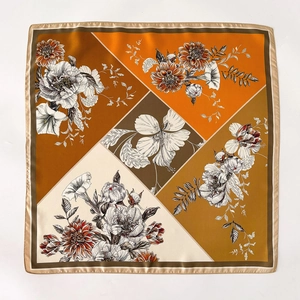 Elegant floral silk square scarf with geometric patchwork in orange and brown tones