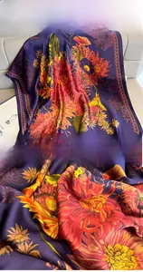 Macro detail of silk shawl showing active carbon dyeing and fine overlock stitching edges