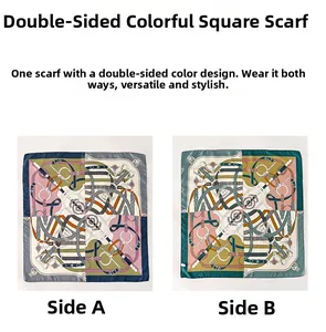 Detail of silk twill square scarf showing equestrian horse harness print and contrast colors
